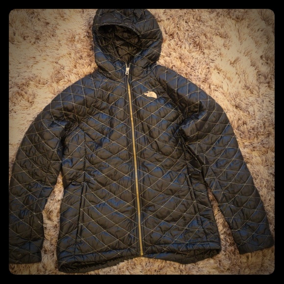 black and gold north face jacket